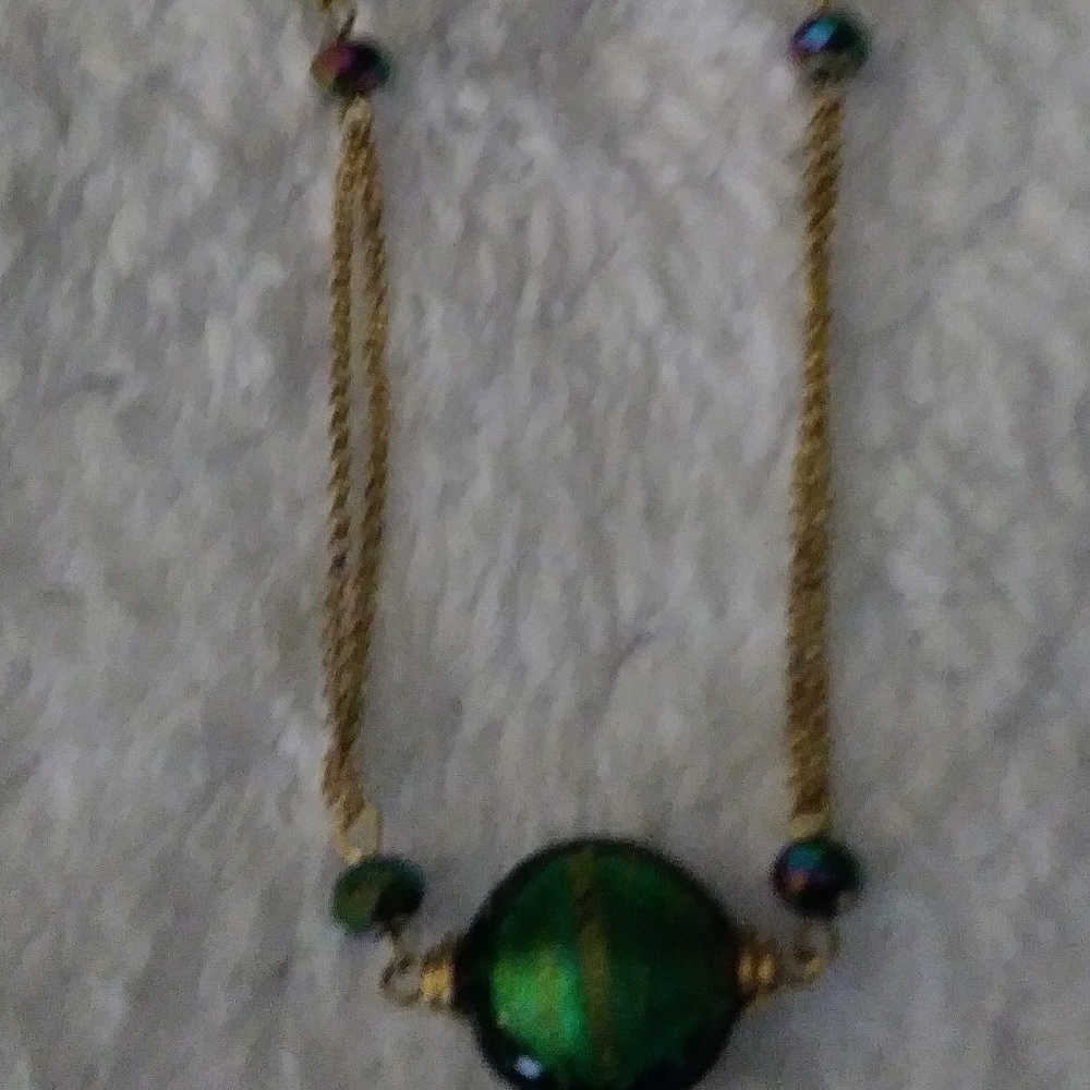Gold plated necklace with green stones NWOT